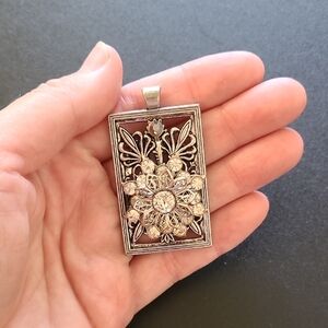 Elegant Silver and Brown Floral Pendant